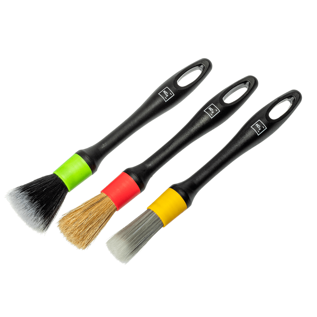 A bottle of Koch Chemie Interior Detail Brush Set on a white background.