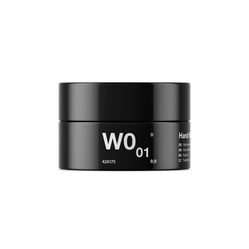 A bottle of Koch Chemie W0.01 | Hand Wax on a white background.