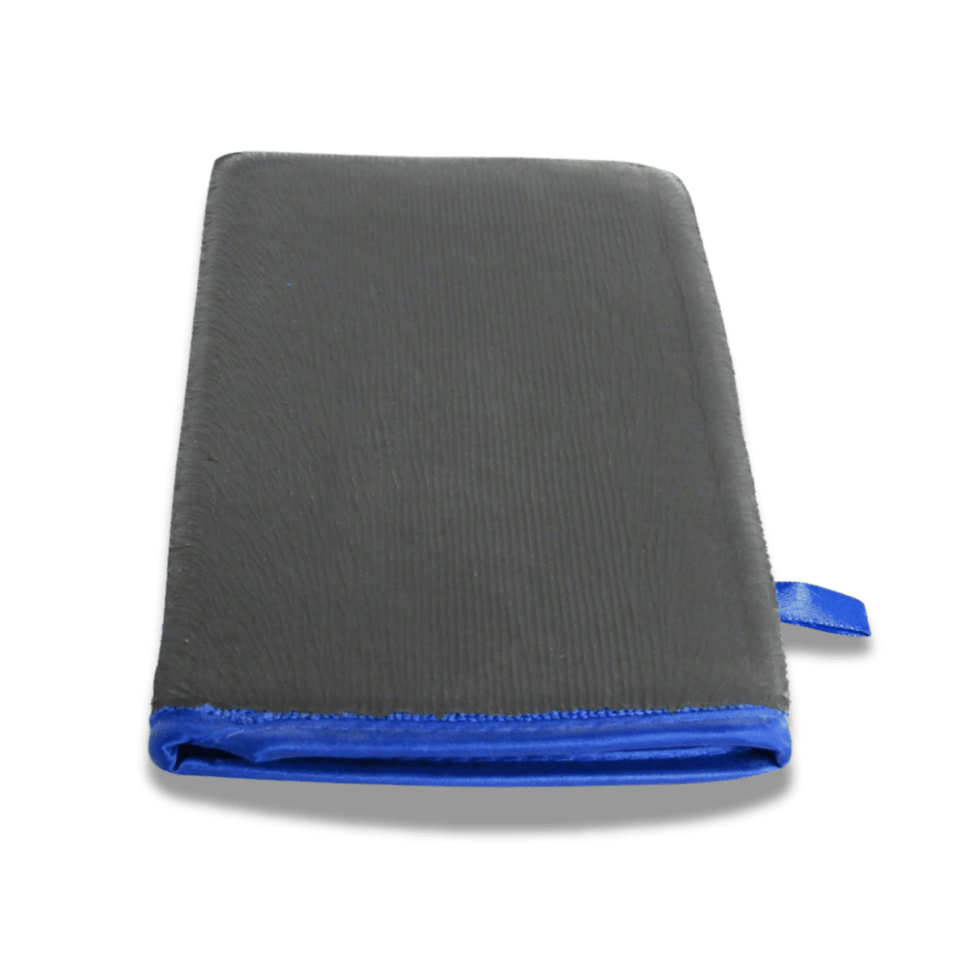 A bottle of Magna Shine Paint Correction Mitt on a white background.