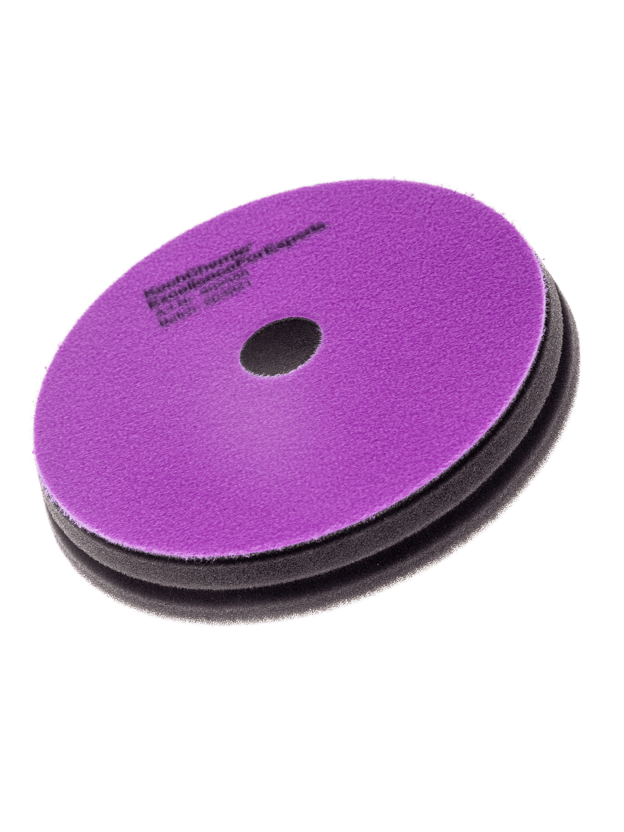 A bottle of Koch Chemie Micro Cut Pad on a white background.