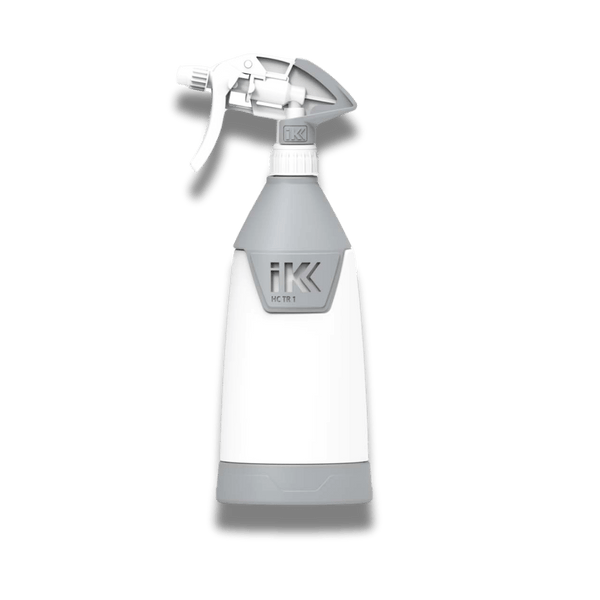 A bottle of IK HC TR 1 on a white background.