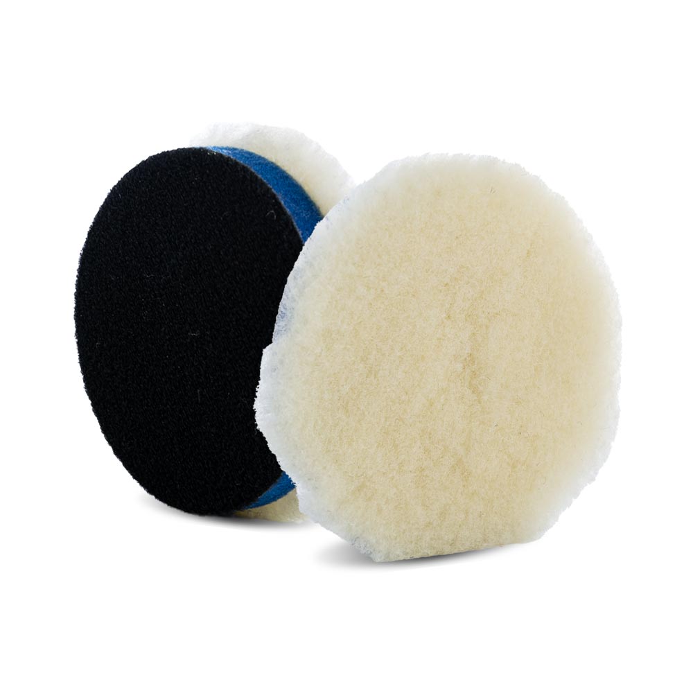 A bottle of Lake Country Premium Low Lint Lambswool Pads on a white background.