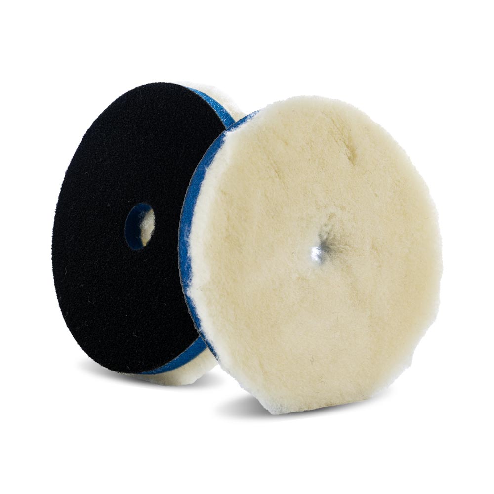 A bottle of Lake Country Premium Low Lint Lambswool Pads on a white background.
