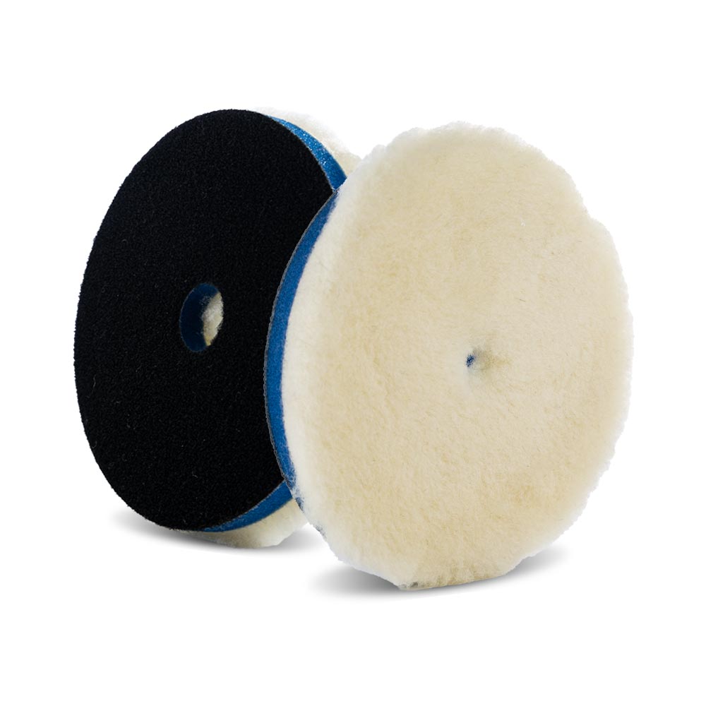 A bottle of Lake Country Premium Low Lint Lambswool Pads on a white background.